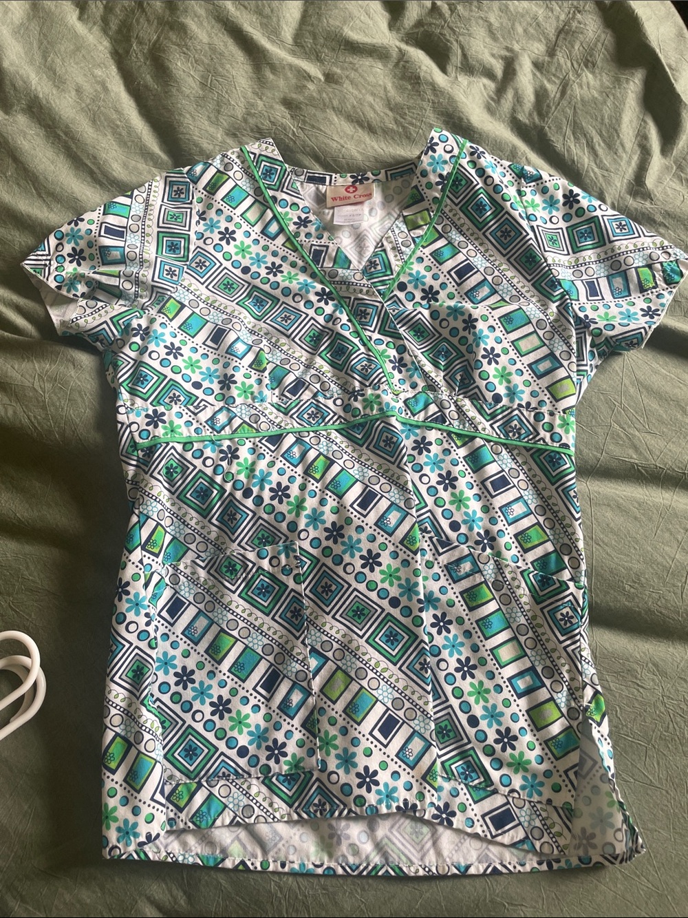 White Cross Printed Scrub Top in Teal, Navy & White